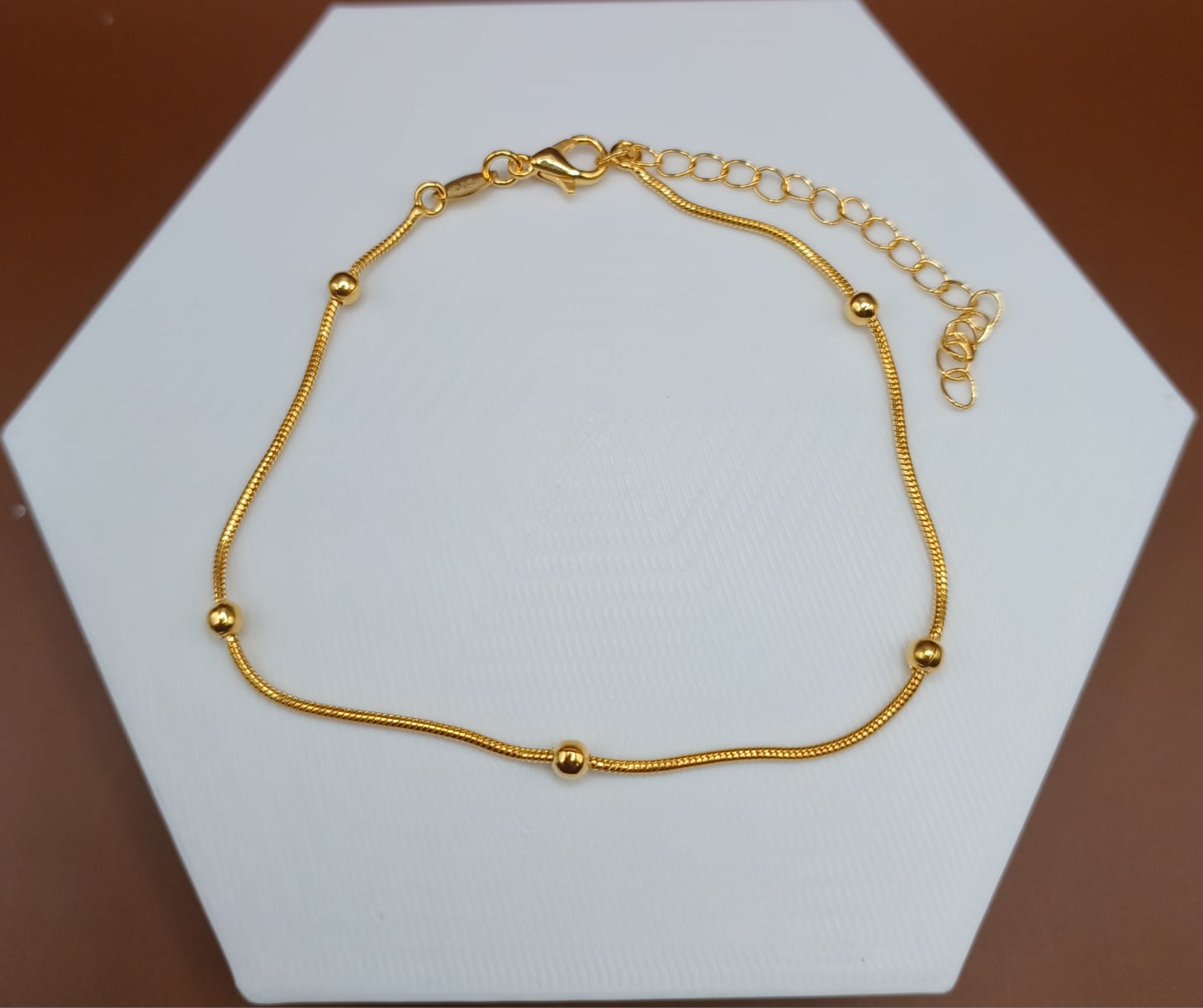 Tornozeleira Esferas