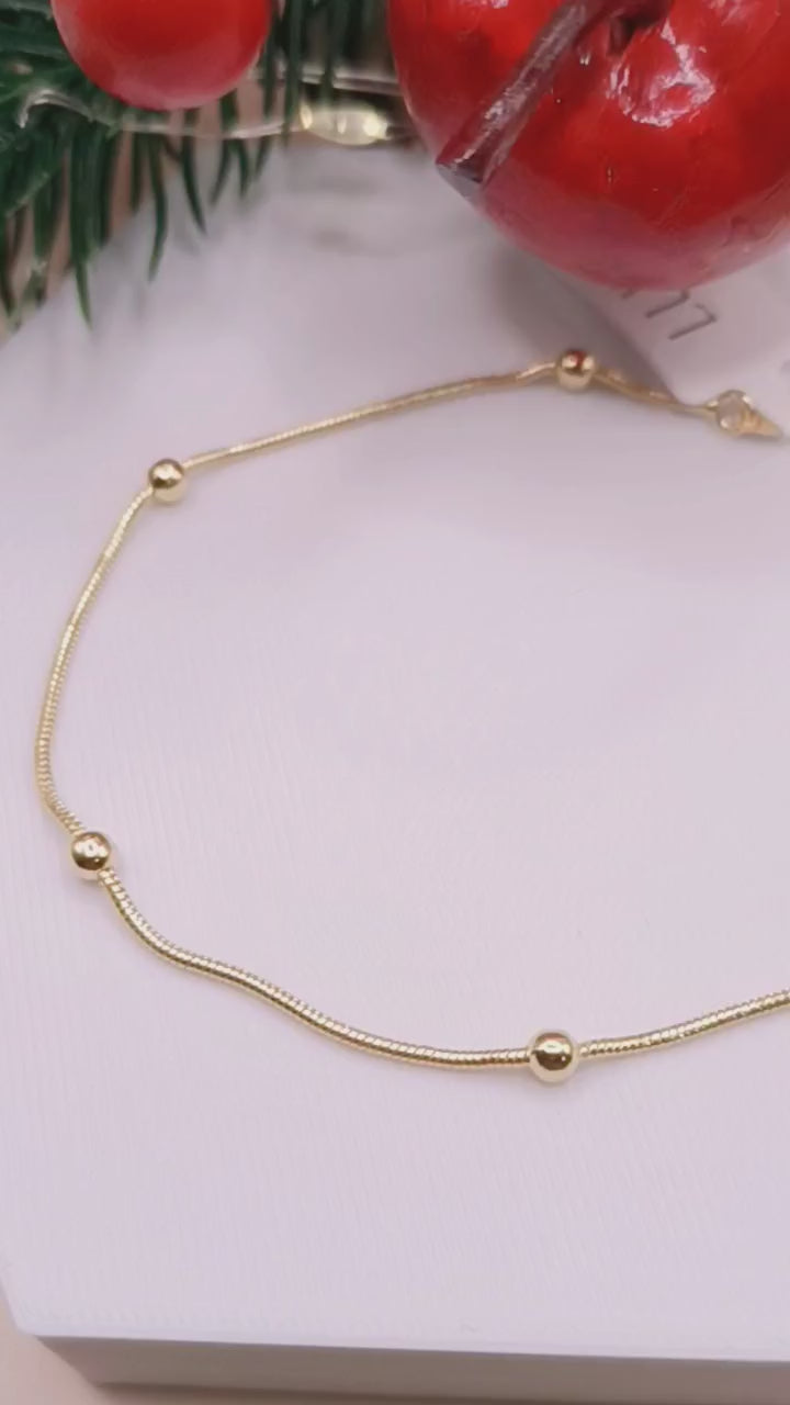 Tornozeleira Esferas